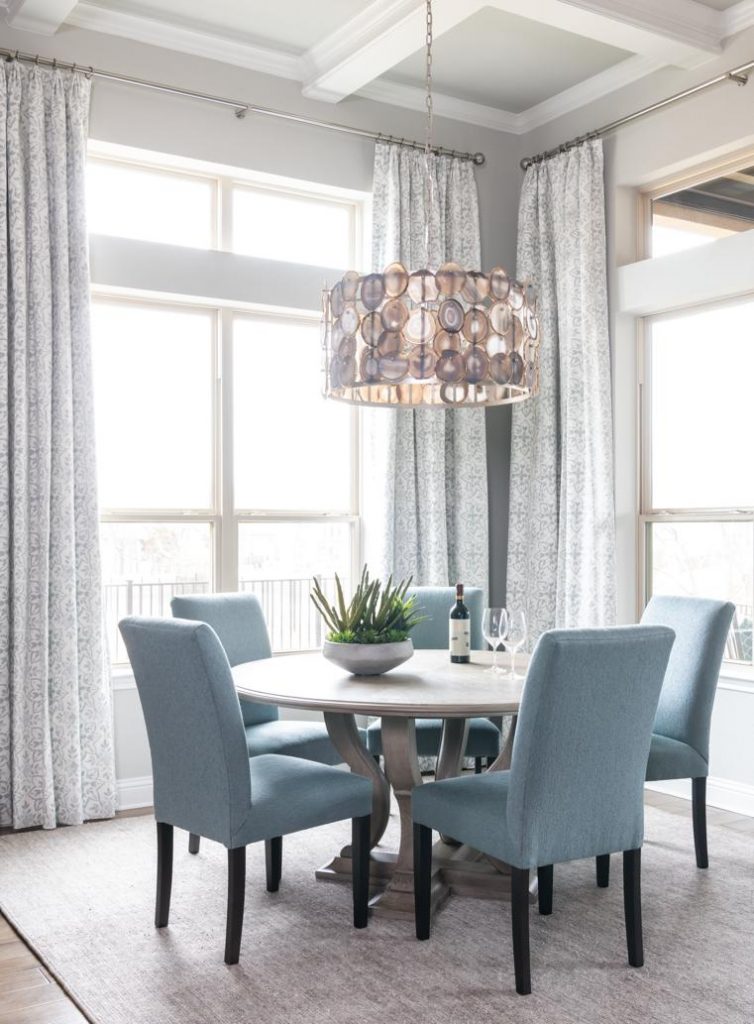 Light airy coastal colors dining room by Dallas interior designer Nicole Arnold