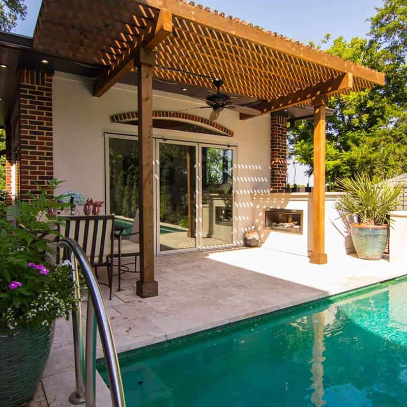 Turn your pool into a beach vaction while stuck at home Outdoor Pool Design from Nicole Arnold Interiors